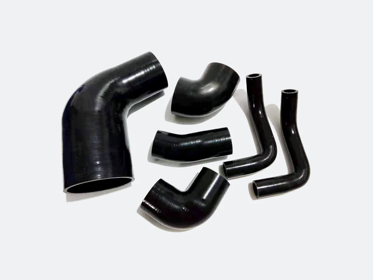Moulded radiator and cooling hoses